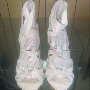 Woman’s shoes ALDO heels size 8.5 that come up around the ankle